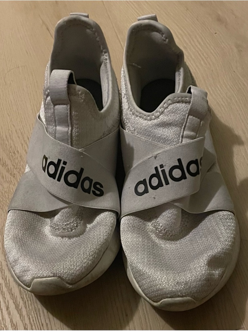 adidas Slip-On Sneakers in White with Black Logo